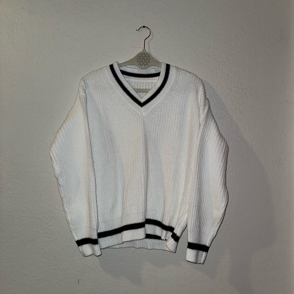 White and navy light sweater